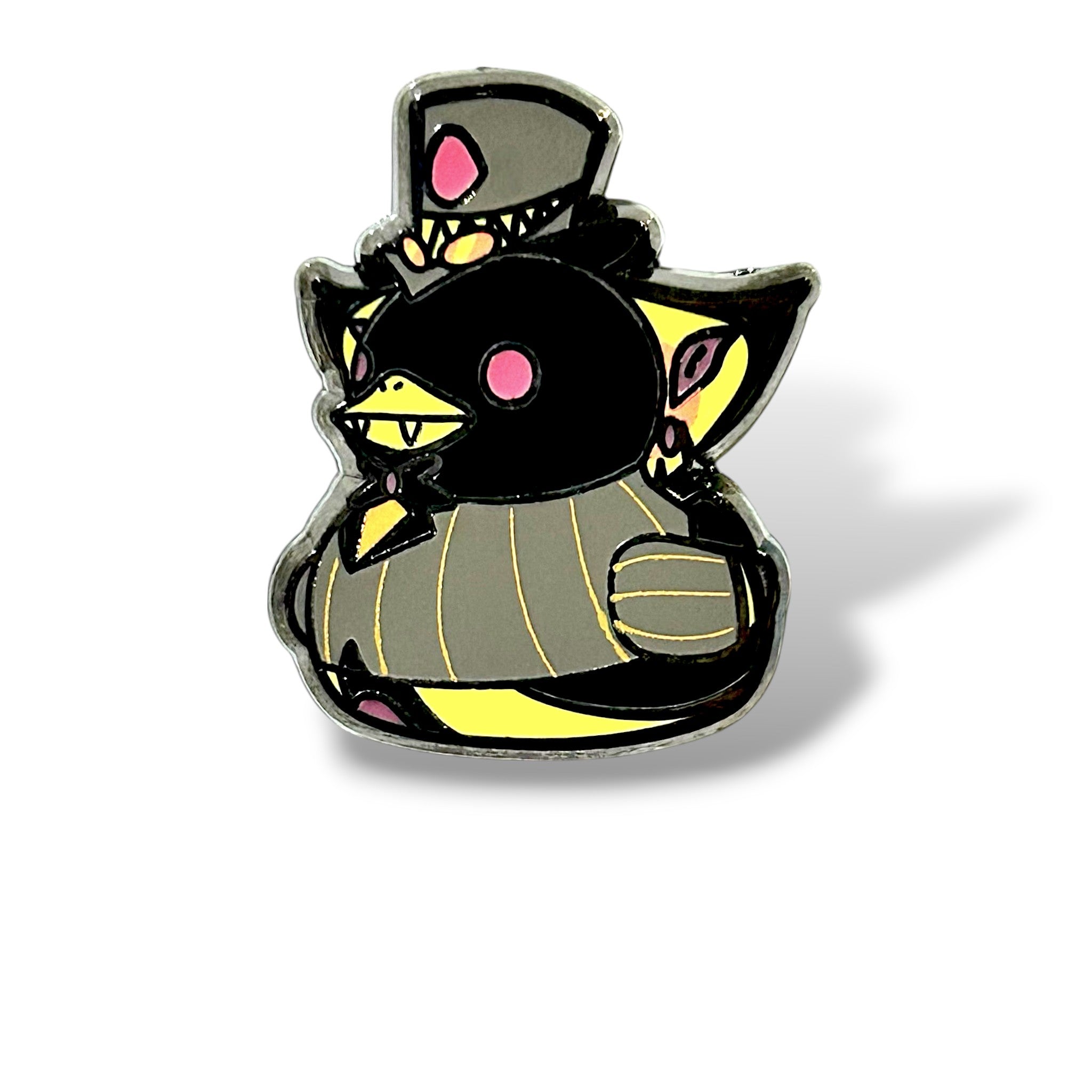 Cartoon-style enamel pin of a duck reimagined as an underworld serpent gentleman. The duck has a sleek black head with pink eyes and sharp yellow fangs, wearing a gray top hat with pink accents, a striped, yellow-and-gray suit, and a bow tie. A monocle-like detail highlights one eye, while its curled tail and wing-like head appendages add a whimsical, villainous flair. The glossy enamel finish and bold colors make it a striking collector’s piece.