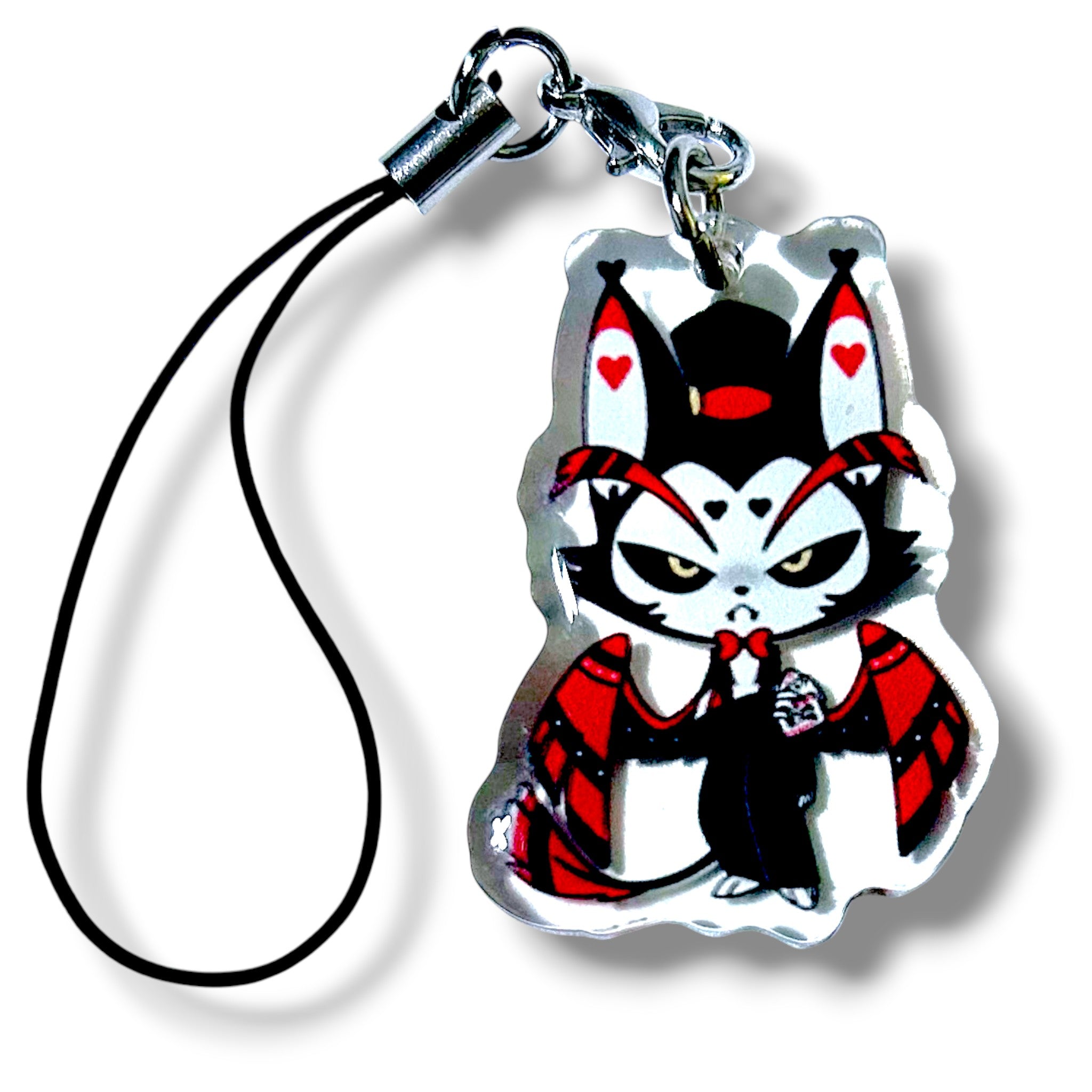 Stylized acrylic keychain charm featuring a cartoon character with large ears or horns, red hearts on its forehead and cheeks, and a stern expression. The character is dressed in a black and red outfit and holds a small object, possibly a drink or potion. The charm is attached to a black strap with a silver clasp, combining bold colors and expressive design for a unique collectible.
