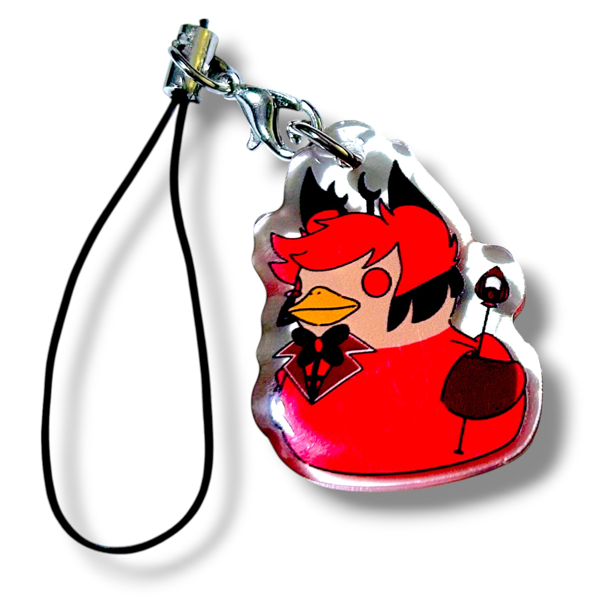 Acrylic keychain charm featuring a cartoon-style duck character with bright red feathers and spiky black-and-red hair. The duck wears a black and red outfit with a bow tie and holds a white-and-red object resembling a microphone or staff. The charm is attached to a black strap with a silver clasp, making it a bold and collectible accessory for fans of animated demon characters and stylized merch.