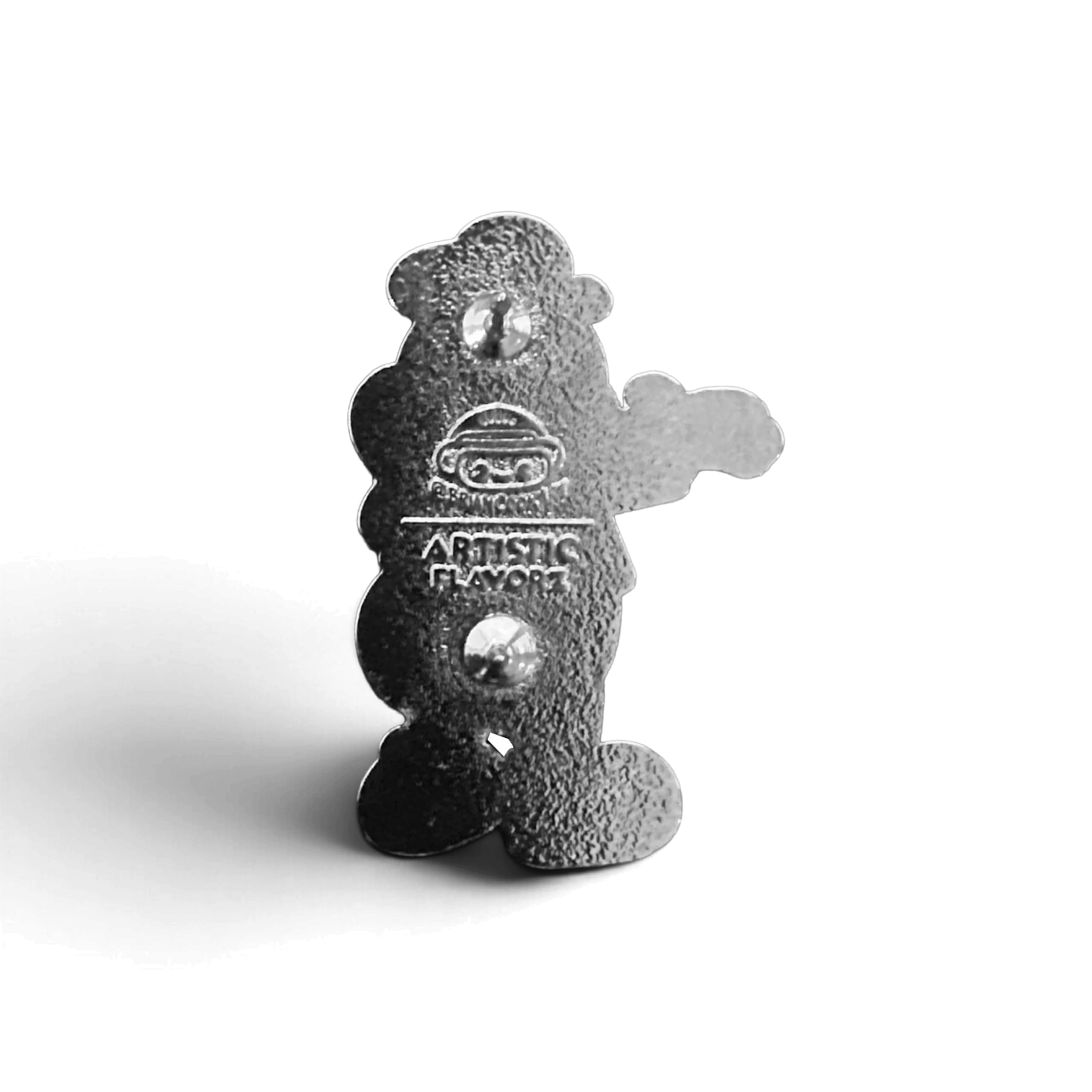 Back of the Jolli-Butt enamel pin, showing a textured silver-toned bear-shaped metal backing with the Artistic Flavorz logo on a white background.