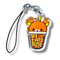 Kawaii-style keychain featuring a cartoon bear submerged in a bubble tea cup. The bear’s orange and yellow head peeks out above the rim, with round eyes and a small nose giving it a cute, relaxed expression. The cup includes a yellow straw and colorful toppings or tapioca pearls. The charm is attached to a black strap with a metal clasp. The design blends cozy bear vibes with playful boba aesthetics, making it a cheerful and collectible accessory.