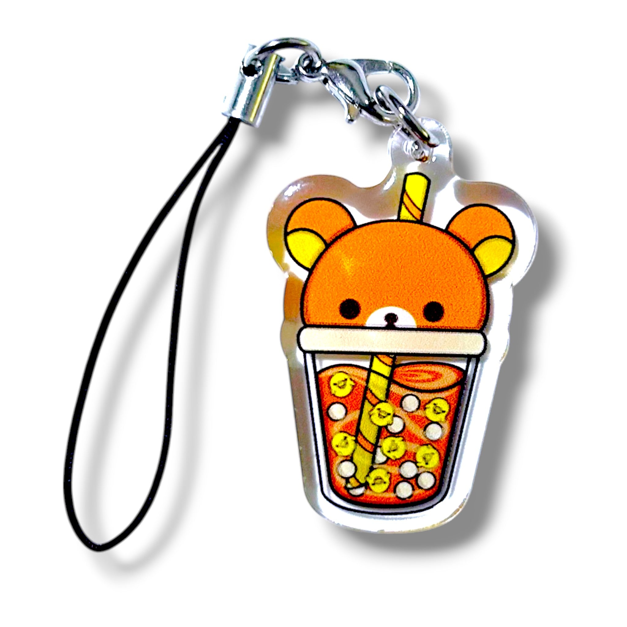 Kawaii-style keychain featuring a cartoon bear submerged in a bubble tea cup. The bear’s orange and yellow head peeks out above the rim, with round eyes and a small nose giving it a cute, relaxed expression. The cup includes a yellow straw and colorful toppings or tapioca pearls. The charm is attached to a black strap with a metal clasp. The design blends cozy bear vibes with playful boba aesthetics, making it a cheerful and collectible accessory.