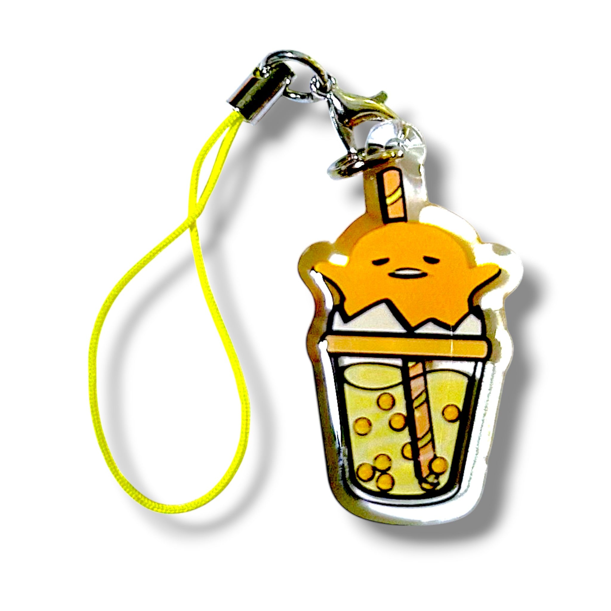 Cartoon-style keychain charm featuring an orange character with a relaxed expression, partially submerged in a bubble teacup. The cup contains several tapioca pearls and has a large straw protruding from the top. The charm is made of clear acrylic and attached to a yellow strap with a metal clasp. The design combines cozy, yolky character vibes with playful boba tea aesthetics, making it a whimsical and collectible accessory.