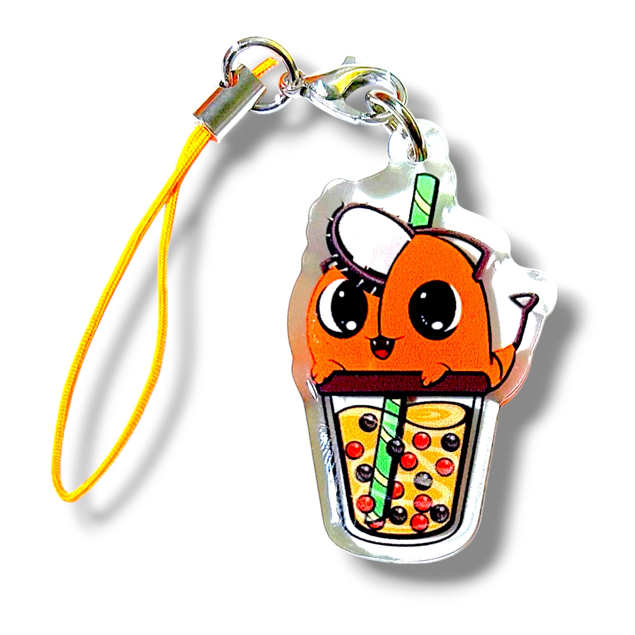 Cartoon-style keychain charm featuring an orange aquatic creature with large eyes and a white fin or hat on its head, sitting inside a bubble teacup. The cup contains black, red, and yellow tapioca pearls and has a green-striped straw. The charm is made of clear acrylic and attached to a yellow strap with a metal clasp. The design blends playful marine character elements with boba tea aesthetics, creating a whimsical and collectible accessory.