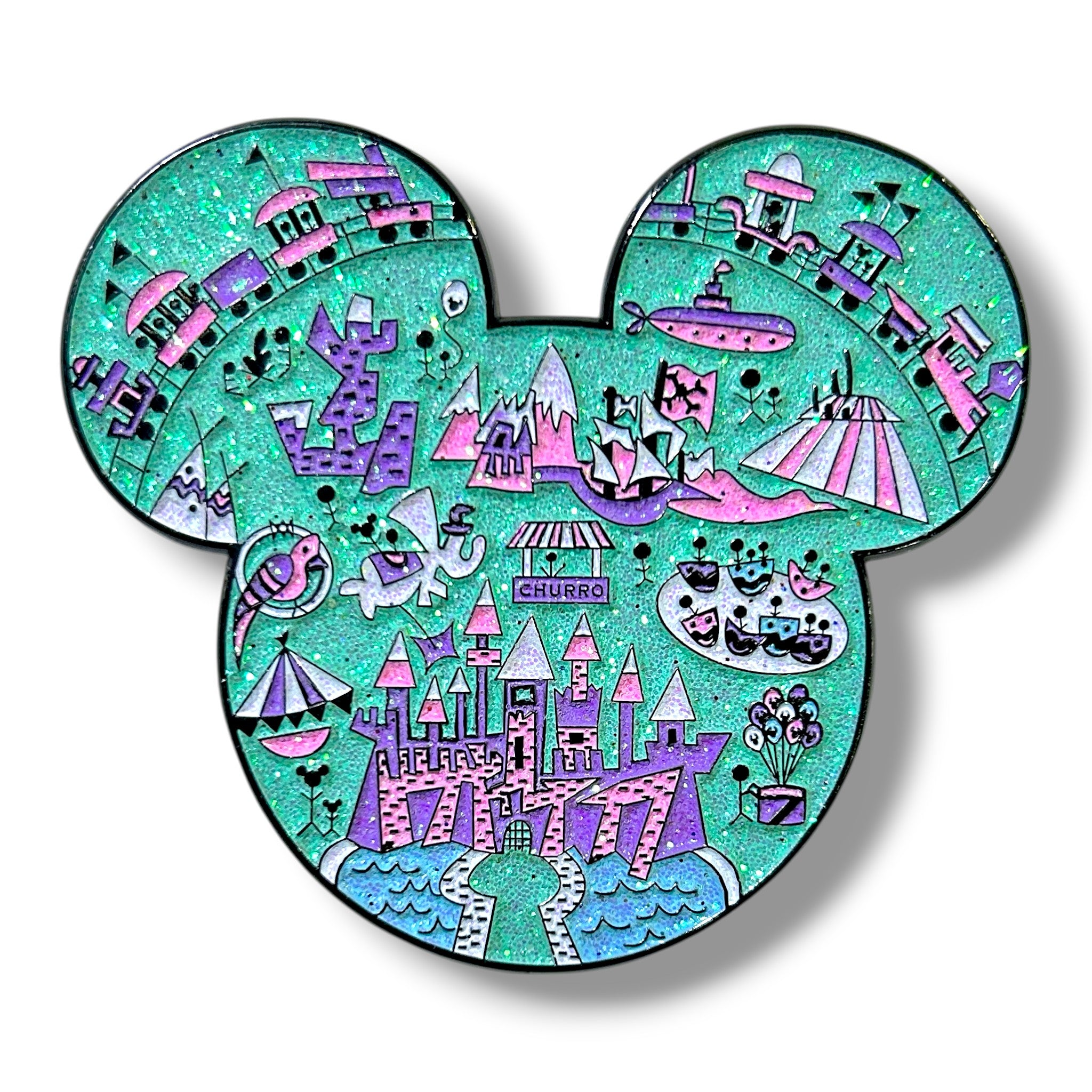 Glitter enamel pin shaped like a mouse head silhouette, filled with colorful theme park-inspired details including a castle, mountain, volcano, monorail, submarine, churro stand, and whimsical buildings, set against a sparkling turquoise background