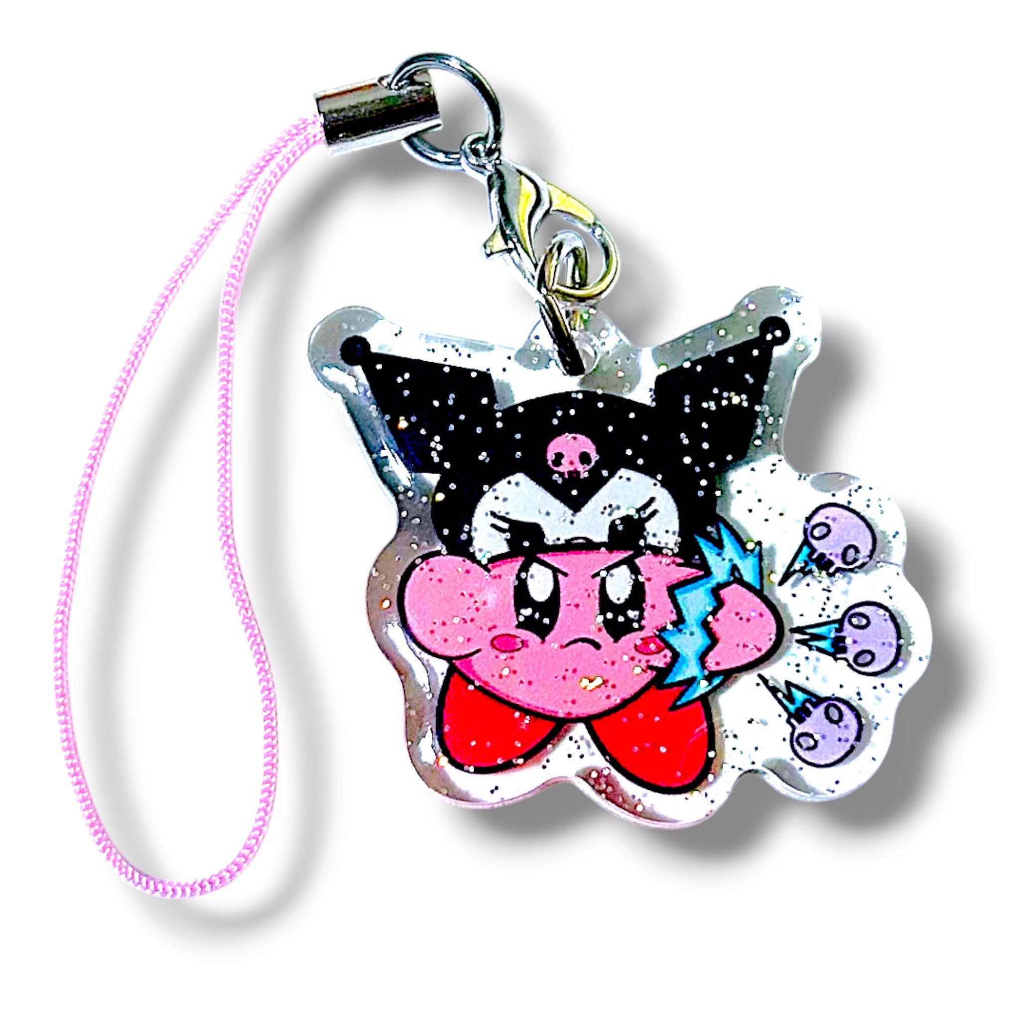 Kawaii-style keychain charm featuring a dynamic mashup character inspired by Kirby. The character has Kirby’s round pink body and red shoes, wearing a black jester-style hat with skull motifs and a determined expression. Kirby is shown punching with a blue burst effect, repelling three small purple creatures with surprised faces. The charm is made of clear acrylic with embedded glitter and is attached to a pink strap with a metal clasp and hook. The design blends edgy flair with playful action, making it a 