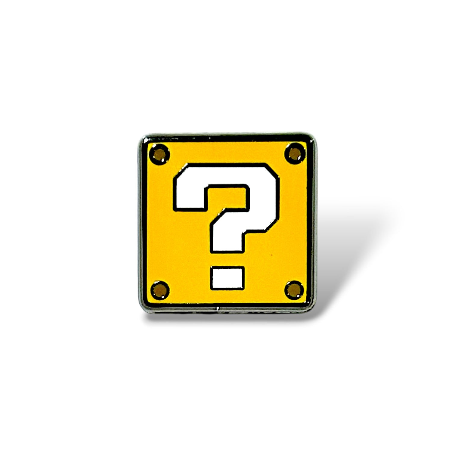 Enamel pin shaped like a yellow square mystery box with a bold white question mark in the center, black outline, and circular bolts in each corner; inspired by classic gaming iconography and designed with a playful, retro style.