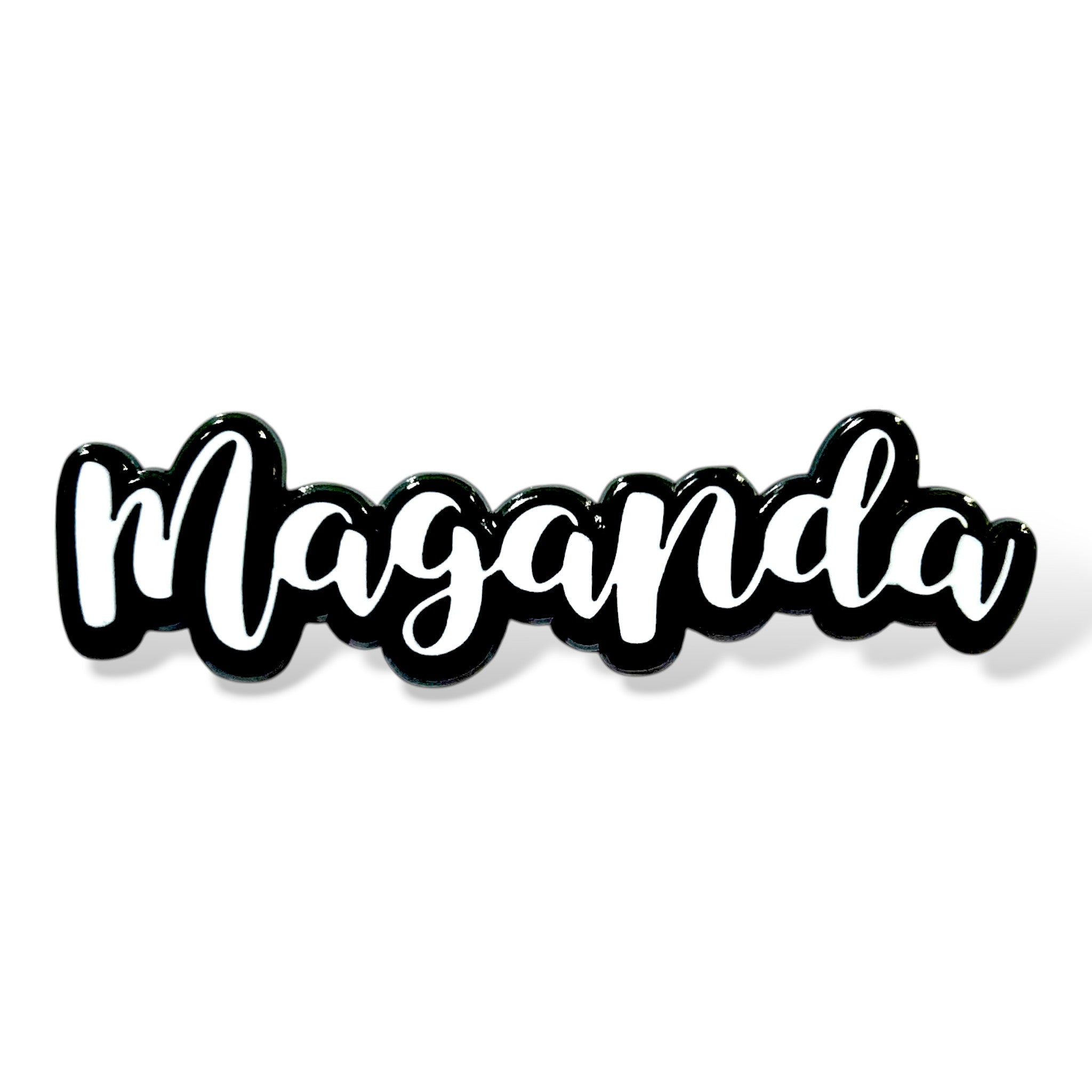 "Stylized cursive text 'Maganda' in white with a bold black outline and glossy finish, designed with a sticker-like look to celebrate Filipino beauty and cultural pride.
